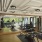 Fitness studio with cardio equipment, weights & yoga space